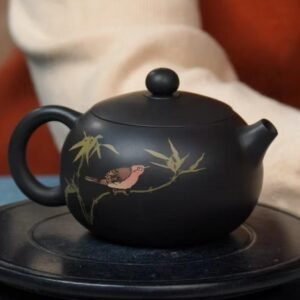 Jianshui Zitao teapot with hand-painted rooster artwork, crafted from natural mineral clay using intangible cultural heritage methods